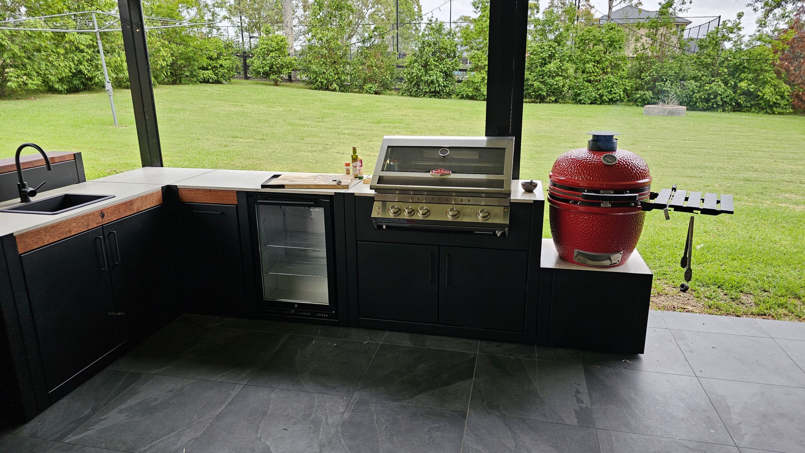 Outdoor kitchen setup in backyard